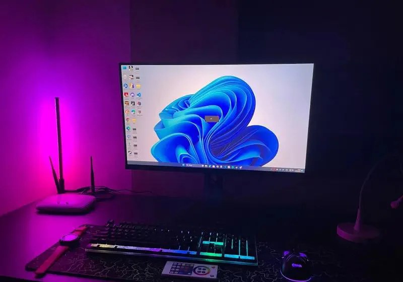 Two 40 cm RGB lamps lighting a gaming desk with purple light